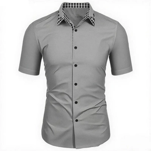 Detail shot of men's casual grey shirt showing the stylish plaid collar trim and buttons