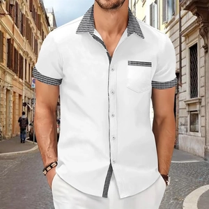Detail of men's white shirt featuring houndstitch patchwork on collar and pocket