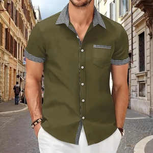 Detail of olive green short sleeve shirt with houndstooth accents and white buttons