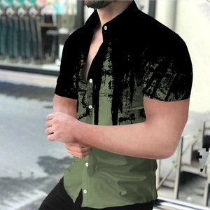 Detail of men's casual gradient short sleeve shirt featuring retro ink splatter print design