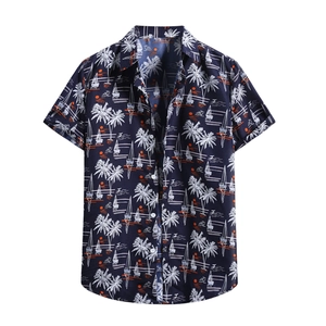 Detail of navy blue short sleeve shirt with white coconut trees and sunset prints