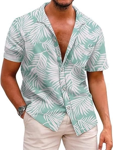 Detail of tropical palm leaf print on mint green short sleeve shirt with chest pocket