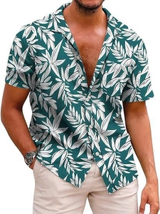 Detail of tropical leaf print and chest pocket on green summer Hawaiian shirt