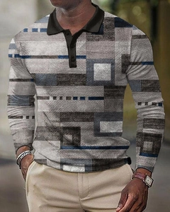 Close-up of polo shirt featuring blue geometric 3D prints and a classic buttoned collar
