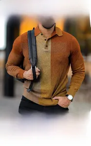 Detail of men's polo shirt showing orange rib-knit texture and buttoned polo collar