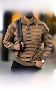Detailed close-up of khaki 3D striped texture on long-sleeve polo shirt for men
