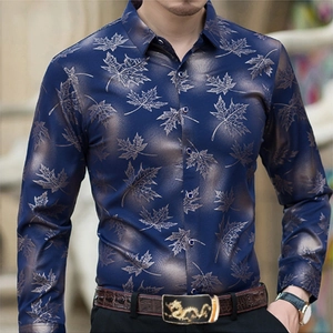 Detail of slim-fit navy shirt featuring metallic gold maple leaf prints and silk texture