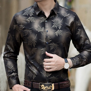 Men's slim fit long sleeve shirt featuring golden maple leaf print on black fabric
