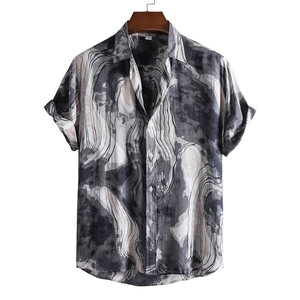Detail of modern marble print fabric and classic collar on men's short sleeve casual shirt