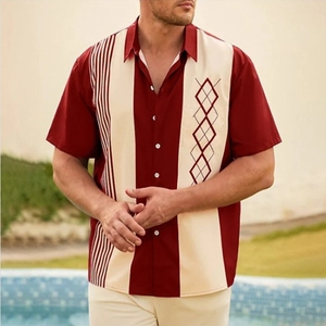Detail of burgundy and cream patchwork bowling shirt with retro diamond pattern and lapel