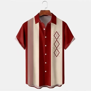 Detail of color-block striped shirt on a wooden hanger with geometric diamond print