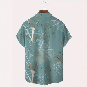 Detail of teal short sleeve shirt with tropical palm leaf print and classic Cuban collar