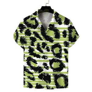 Detail of casual short-sleeved shirt featuring green stripes and black leopard pattern