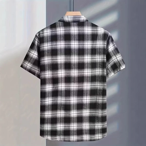 Rear view of classic black and white checkered short-sleeve shirt with wooden hanger
