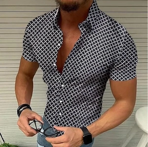 Detail of men's short-sleeved plaid shirt featuring black and white geometric grid texture