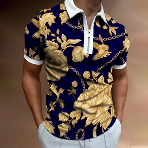 Detailed close-up of men's polo shirt with gold baroque floral print and silver zipper neck