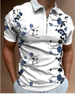 Detail of men's polo shirt featuring blue floral print and silver zipper placket
