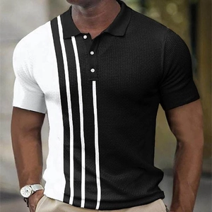 Close-up of men's waffle polo shirt with black and white color block and stripe details