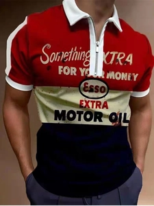 Detail of men's polo shirt with Esso vintage print and zipper collar in color block