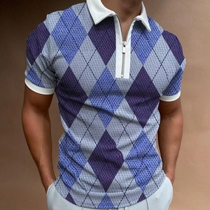 Detail of men's argyle polo shirt featuring blue and purple patterns and zipper collar