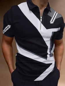 Close-up of men's polo shirt featuring zipper neckline and black and white block pattern