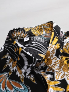 Macro detail of men's tropical print shirt neckline with durable stitching and M size label