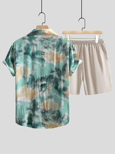 Detail of men's summer vacation set with marble print shirt and beige drawstring shorts