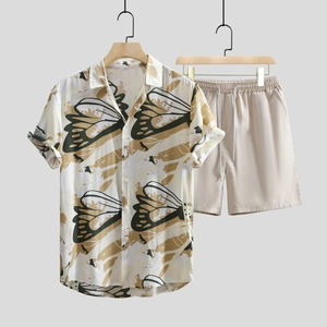 Detail view of men's resort wear set with printed short sleeve shirt and drawstring shorts