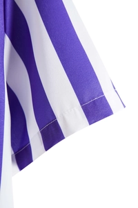 Detail of blue and white striped shirt cuff showing tight stitching and woven texture
