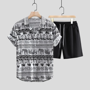 Detail of men's two-piece set featuring bohemian elephant print shirt and black shorts