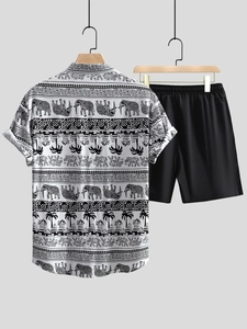Detail of men's summer set featuring short sleeve shirt with elephant and palm prints