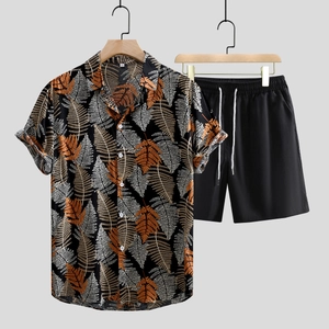 Detailed view of men's casual two-piece set with maple leaf print shirt and black shorts