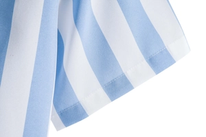 Detail shot of the blue and white striped shirt cuff with high-quality single needle stitching