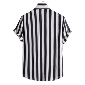 Detail view of black and white vertical striped short sleeve shirt back showing tailoring