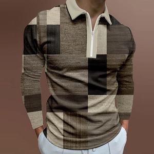 Close-up of men's polo shirt featuring geometric color-block pattern and silver zipper detail