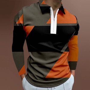 Detail of men's polo shirt with orange geometric color block patterns and white zipper