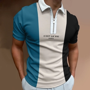 Detail of men's polo shirt with color-block design, zipper collar, and Paris text print