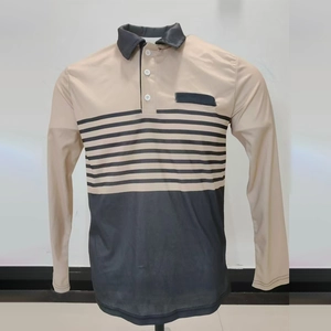 Detail of long sleeve polo shirt showing beige and dark grey color-block striped design