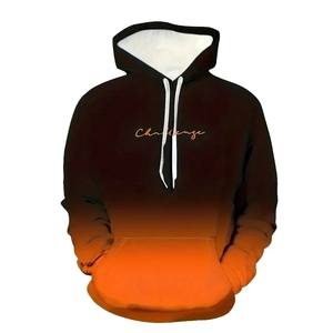 Detail of men's hoodie featuring orange Challenge print and smooth black to orange gradient