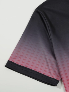 Close-up of polo shirt sleeve with gradient pixel print and durable flatlock stitching