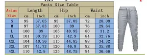 Tableau des tailles détaillé pour pantalons de sport homme avec mesures de taille