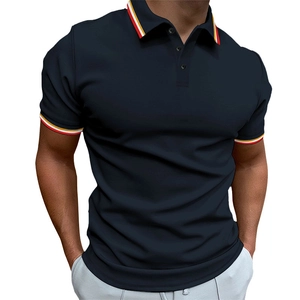 Detailed view of navy blue polo shirt featuring striped contrast ribbed collar and cuffs
