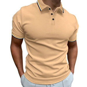 Detail of slim fit men's polo shirt featuring ribbed stripe trims on collar and cuffs