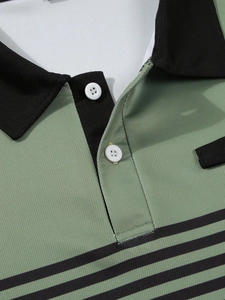 Macro detail of sage green mesh polo shirt with black contrast collar and buttons