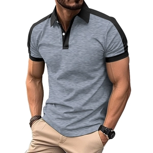 Detail of grey polo shirt featuring black shoulder panels and two-button contrast collar