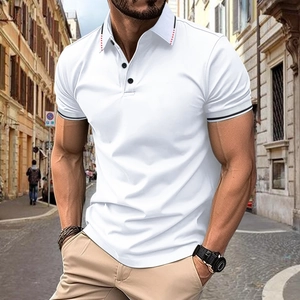 Detail of white men's polo shirt with red stitched collar and black ribbed cuff details