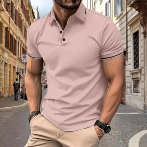 Detail of pink polo shirt featuring ribbed collar with black and red accents