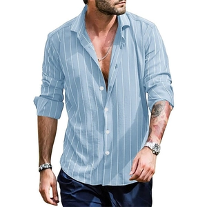 Detail of light blue striped men's long sleeve shirt with white buttons and collar