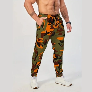 Pantalon de jogging camouflage pour homme avec motifs orange et vert et cordon de serrage