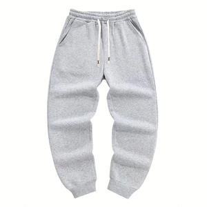 Men's light grey joggers with elastic drawstring waist and ribbed cuffs for athletic wear